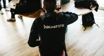 Hacker discovering a business logic vulnerability